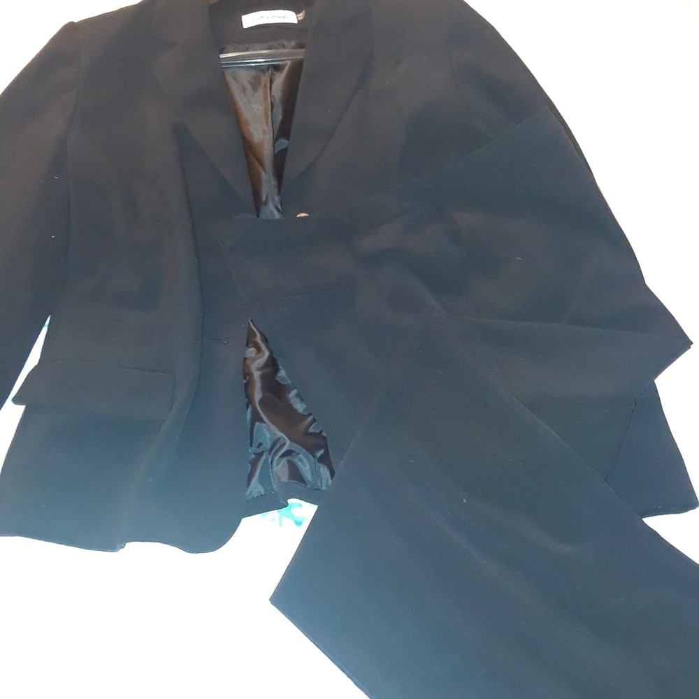 Calven Klein suit